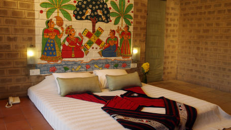 deluxe rooms at the village resort stay near Bangalore