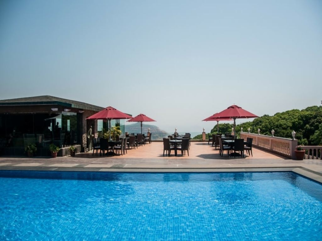 swimming pool at brightland resort and spa