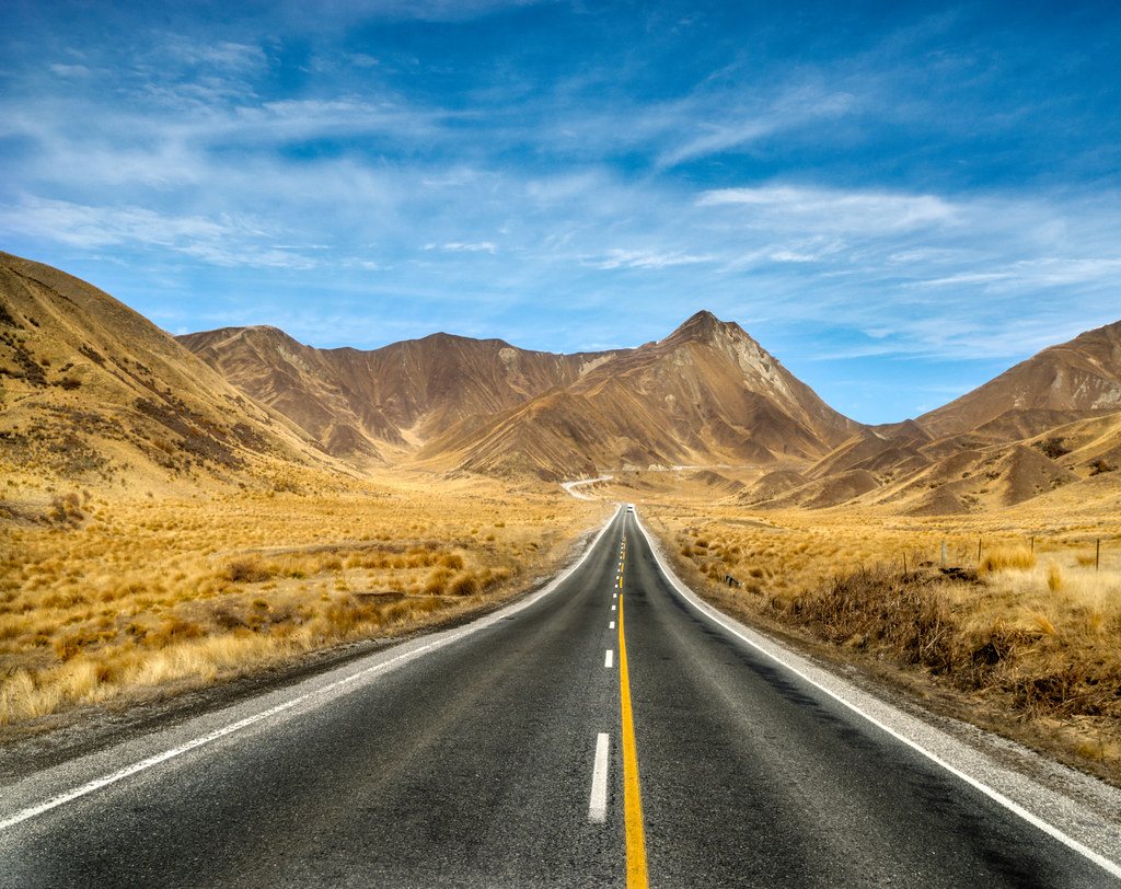 Wallpaper ID: 224120 / a long empty asphalt road through dry plains with  snowy mountains on the horizon, long road into the mountains 4k Wallpaper