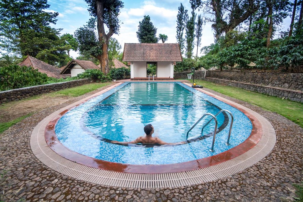 outdoor pool at mystic luxury resort in Coorg